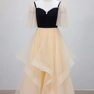 Robe de bal noire avec haut et bas champagne, longueur thé